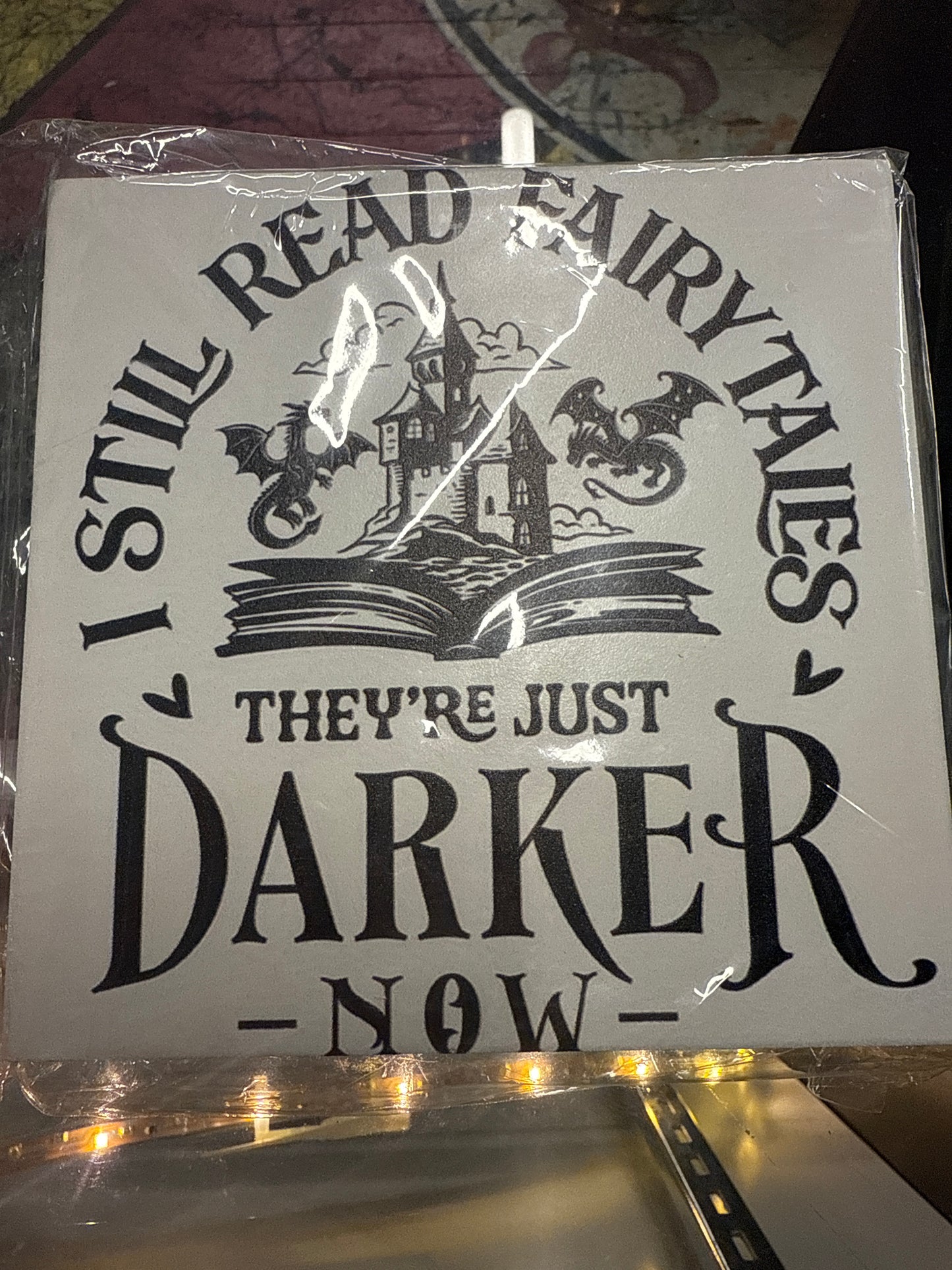 I still read fairytales they’re just darker now sign